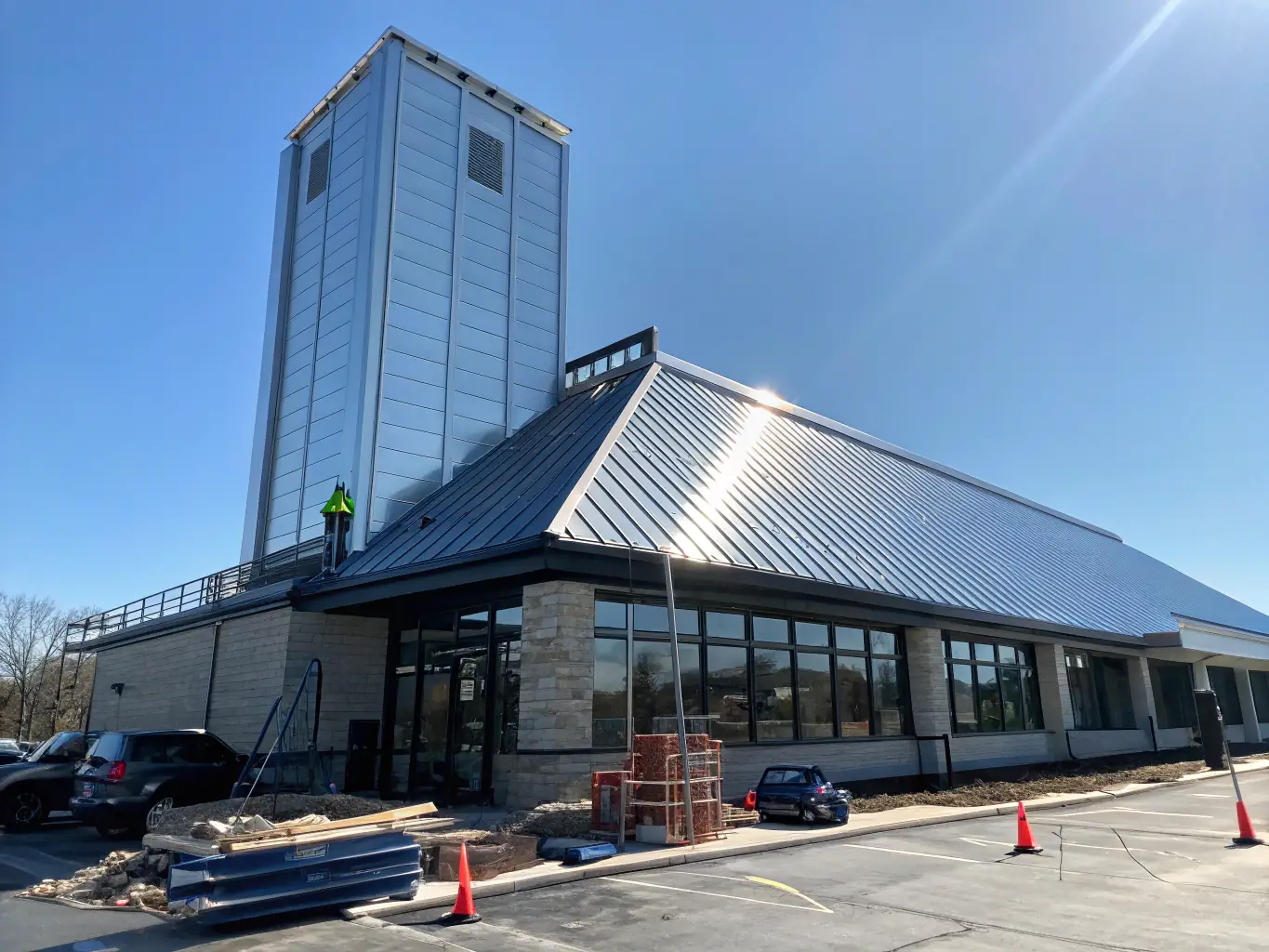 An image showcasing a newly installed roof on a commercial building, highlighting the durability and aesthetic appeal of professional roof replacement services.